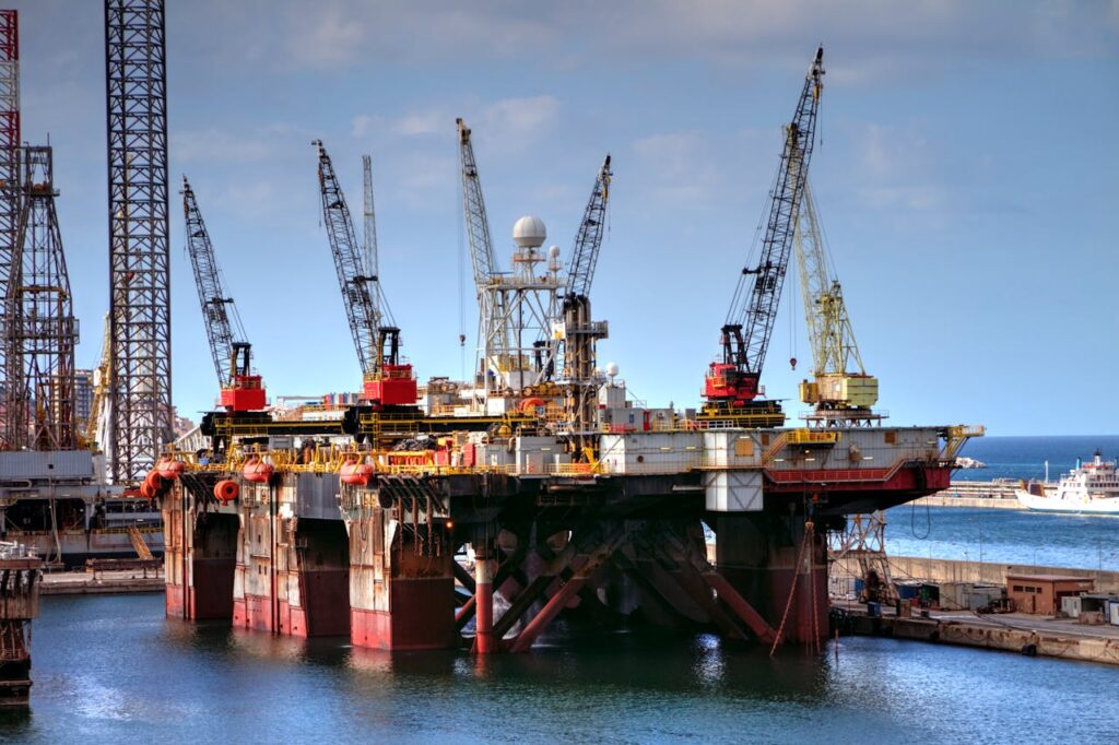 pexels-photo-11139595 Offshore oil platform with cranes in Palermo harbor, capturing industrial and marine infrastructure.